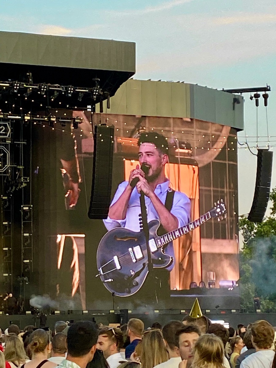Marcus Mumford on the Great Oak Stage at Hyde Park greeting the London crowd, ten years since the band last played the park